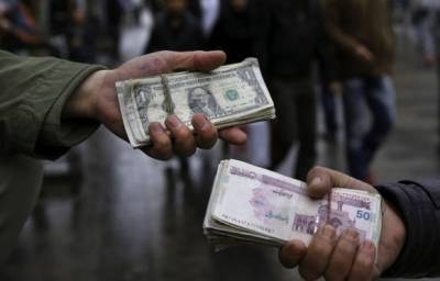 Иран прекращает использование доллара в расчетах с зарубежными странами